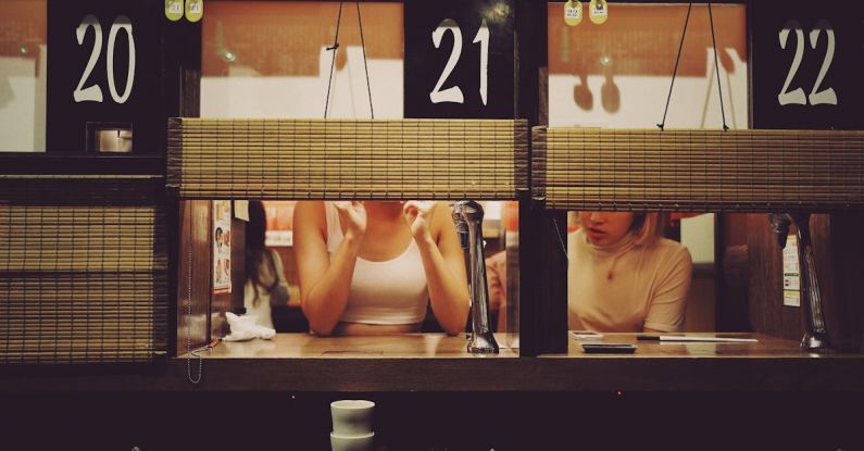 Tokyo Food - Photo of Two Women Sitting Beside Each Other