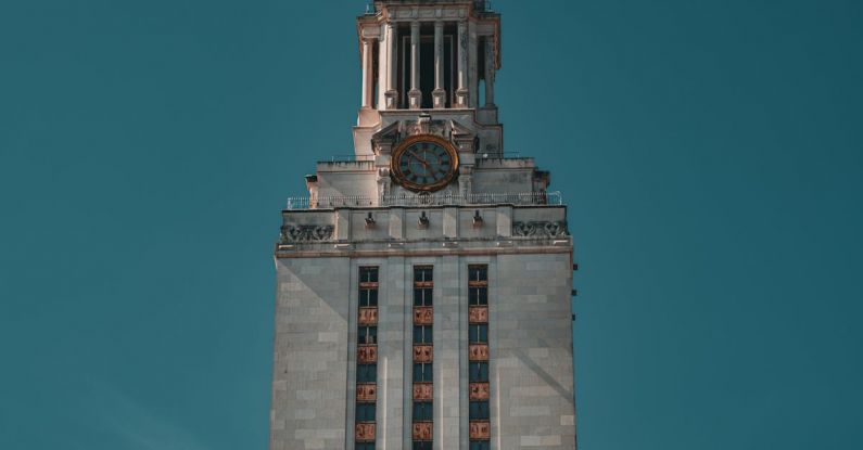 Austin Barbecue - A tall clock tower with a clock on it