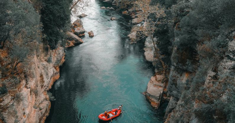 Rafting Grand Canyon - Inflatable Raft on a River in a Valley