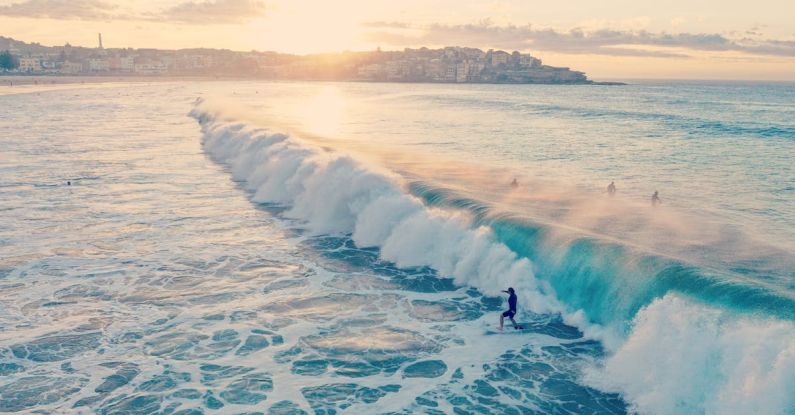 Surfing Australia - Photo of Man Surfing on Ocean Waves