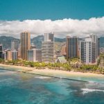 Waikiki Beach - High Rise Buildings Near Sea Under Blue Sky