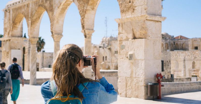 Jerusalem Ancient - Woman Taking Pictures of Ruins
