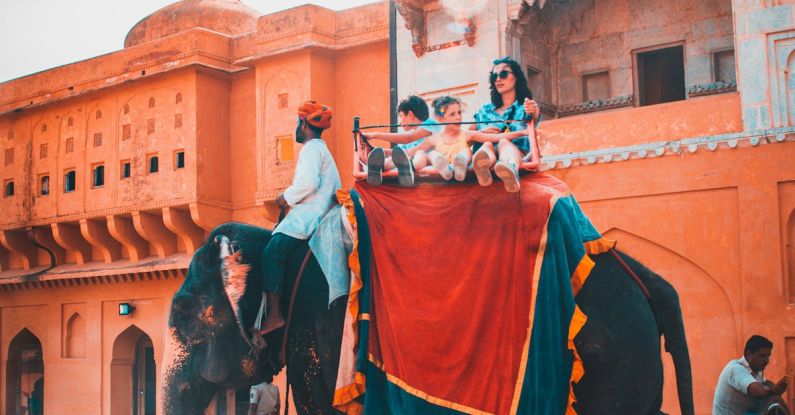 Rajasthan Palace - People Riding Elephant